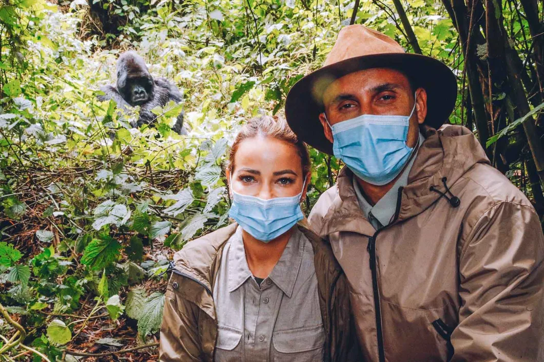 honey mooners gdoing gorilla trekking